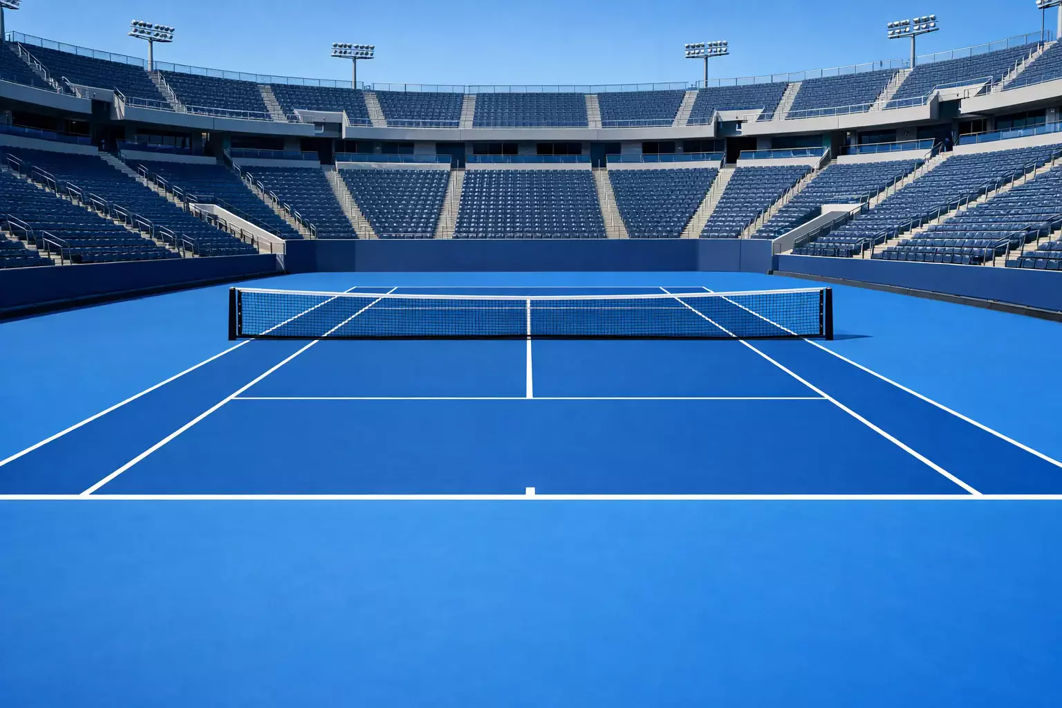 Pista de tenis de superficie dura azul en estadio profesional